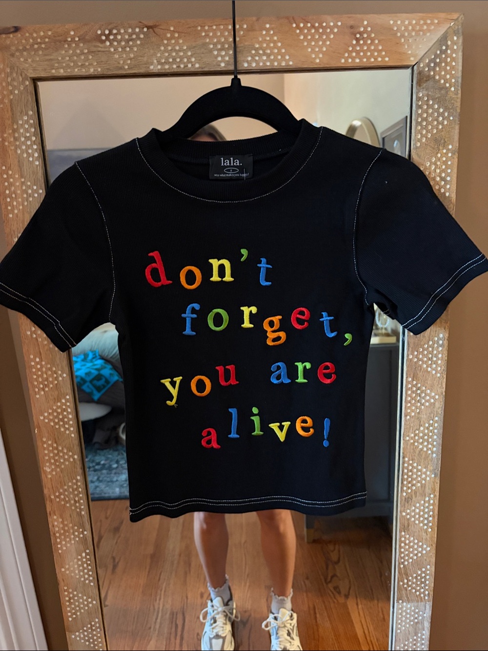 Dressed in LALA Black Tee with Multicolor Embroidered Text